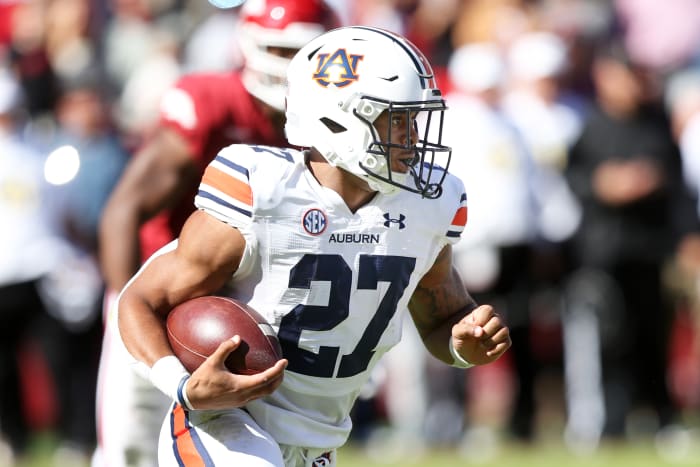 Oct 16, 2021; Fayetteville, Arkansas, USA; Auburn Tigers running back Jarquez Hunter (27) rushes during the first quarter against the Arkansas Razorbacks at Donald W. Reynolds Razorback Stadium. Mandatory Credit: Nelson Chenault-USA TODAY Sports